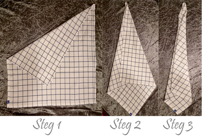 Tre steg till servettvikning av en slips